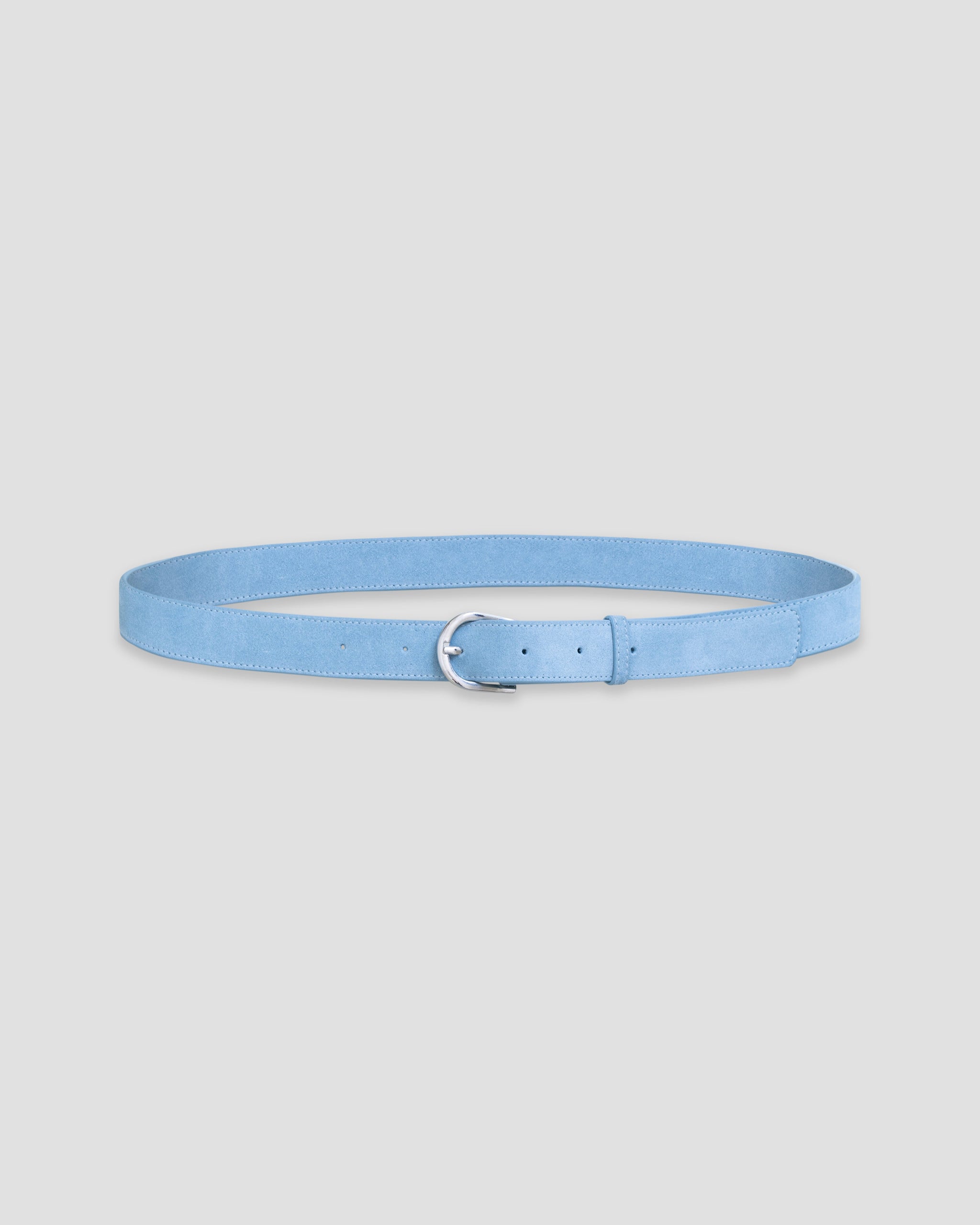 A light blue leather belt with silver metal buckle on a white background. 